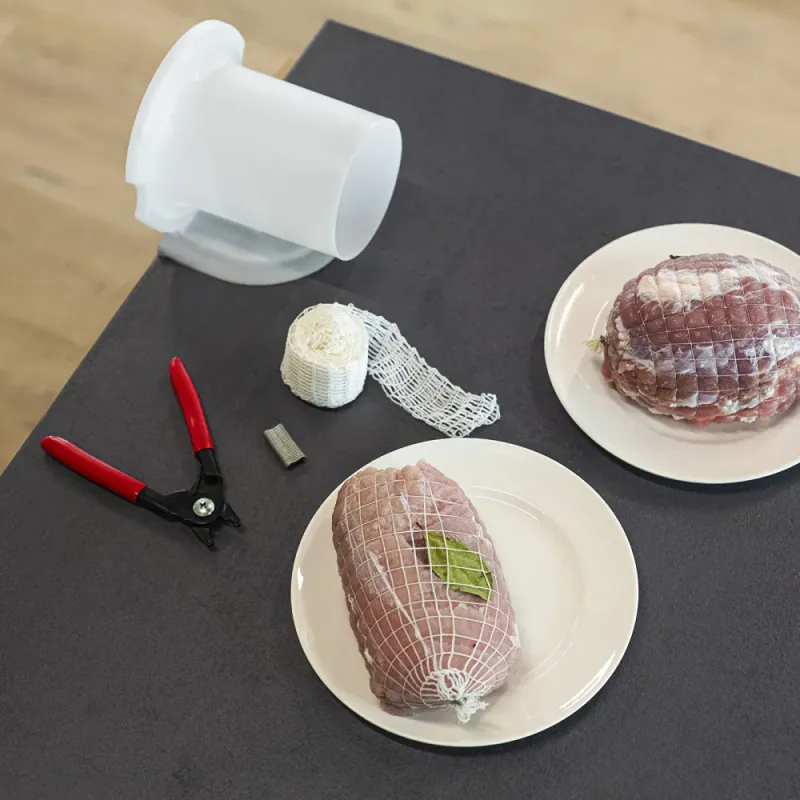 Meat netting applicator for ham and cheese 